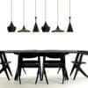 Judit Arabic Inspired Pendant Light - A modern dining room with a long black table and chairs. Above the table, a row of six black pendant lights with a unique teardrop shape hang from the ceiling.