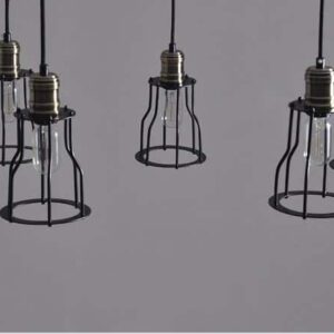 Ebba Hanging Cage Creative Pendant Light - A row of five industrial-style pendant lights with cage shades and Edison-style bulbs. The lights are hanging from a ceiling against a neutral background.