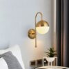 Ragnoku Yellow Copper Round Globe Wall Lamp-bedside lamp