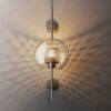 Ramoosin Clear Glass Metal Grill Wall Lamp - sphere