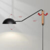 Marika Long Arm Wall Lamp - swing light